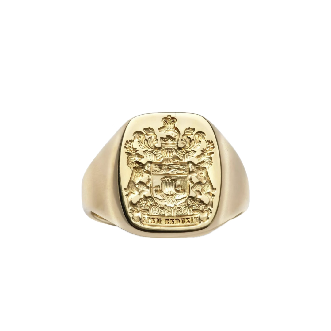 Yellow-gold cushion signet ring engraved with a hand-cut family crest